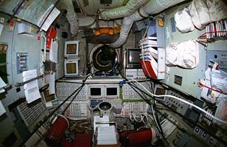 Interior view of the Mir Space Station includes the Base Block commander's port.